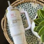 Stanley-Swirl-Quencher-H2.0-40-oz-Experience-Ice-Cold-Bliss-Ergonomic-Stanley-Tumbler-Thermos-rose-quarts-bg